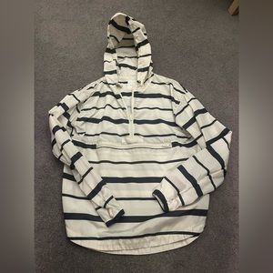 White and blue striped wind breaker. Size small. Thread and supply.